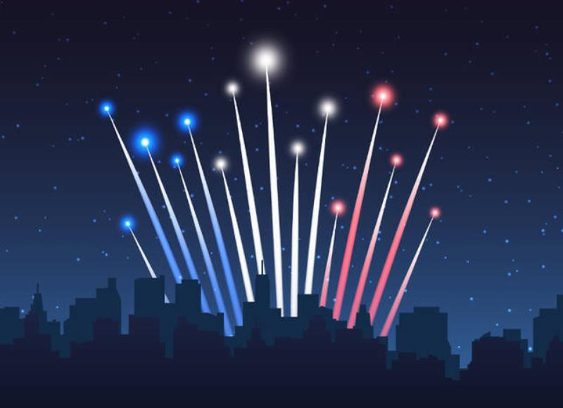 Famille joyeuse pique-niquant lors de la fetes nationale avec des drapeaux français